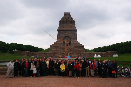 The participants in front of the monument of the Battle of the Nations