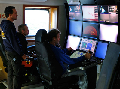 Odyssey Senior Project Manager Andrew Craig directs operations on the SS Gairsoppa shipwreck site from the ROV control room aboard the Seabed Worker. Photo: Odyssey Marine Exploration, Inc., www.odysseymarine.com