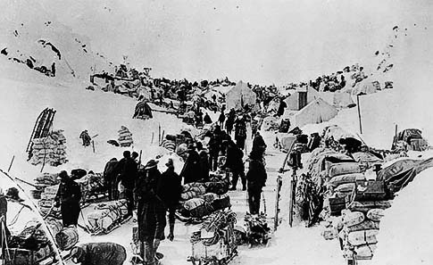 At Chilkoot Pass, Canadian police checking the prospectors' food supplies