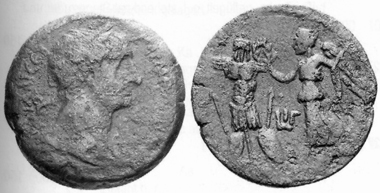 Trajan, 98-117. AE, 109/110. Rev. Nike with palm branch, crowning a trophy. MMDe 14 (2004), 766.