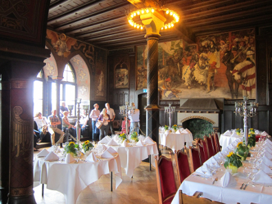 The coin dealers marvel at the state rooms of Burg Castle that were built in the 19th century. Photograph: UK.