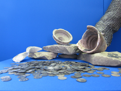 Hoard of coins discovered during construction works in 1952. Photograph: UK.