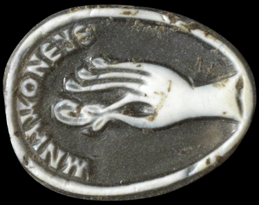 1100: Cameo with hand and Greek inscription. Roman, 3rd- 4th cent. A. D. H 1.5 cm. Tiny chips missing. Estimate: 4,000,- euros. Hammer price: 6,500,- euros.