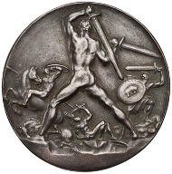 German Empire. 1914. Artist: Josef Gangl. Nude male figure standing to r. with back to viewer, holding two swords in raised arms; in front of battle scene.