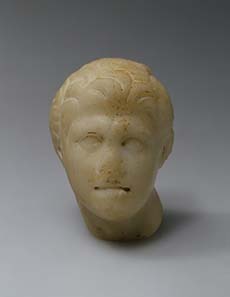 Head of Alexander (fragment of a figure), Asia Minor, Bithynia(?), Roman copy, 1st century BC, after Greek original. 175-150 BC, Fine-grained marble, h 6 cm. ©State Hermitage Museum, St Petersburg.
