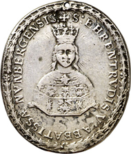 3231: Nonnberg near Salzburg. Silver pendant, upright oval, c. 1682 from the Seel workshop. Bust reliquiary of St. Ehrentrud of Nonnberg, signed P-S. Rev. Shield of St. Benedict. 38x33.5 mm. Holed, to be worn. Very fine. Estimate: 100 euros.