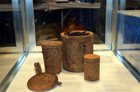 In these canisters the gold coins were found in 2013.