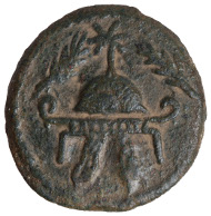 Herod the Great (40-4 BC), bronze coin, minted in Samaria 37 BC. Obverse: helmet flanked by two palm branches. Reverse: bowl on a tripod; Greek: of King Herod. © Israel Museum, Jerusalem. Helmet and palm branches symbolize Herod's power and his victory over the last ruler from the Hasmonean dynasty.