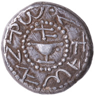 The First Jewish Rebellion. Shekel, minted in Jerusalem, year 1 (AD 66). Obverse: goblet, above it aleph (year 1); Paleo-Hebrew: Shekel of Israel reverse: branch with three pomegranates; Paleo-Hebrew: Jerusalem is sacred. © Israel Museum, Jerusalem.
