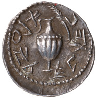 Second Jewish Rebellion. Zuz, minted in Jerusalem, AD 133. Obverse: ewer; Paleo-Hebrew: Shimeon. Reverse: Paleo-Hebrew: for the freedom of Jerusalem. © Israel Museum, Jerusalem. At times Roman denarii were re-struck; this made the production of planchets obsolete, but they also literally overlay the colonial power, making it unnecessary to spell out the political message.