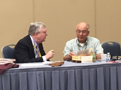 Dr. Levon Saryan (right) talking with collector Robert Leonard at the ANAS launch held on the sidelines of the ANA World's Fair of Money in Chicago.