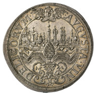 Free Imperial City Augsburg. Taler, 1641. Armoured and draped bust of Emperor Ferdinand III of Habsburg (1637-1657) to the right, around his neck the chain of the Order of the Golden Fleece. Rv. Cityscape of Augsburg, in the foreground city fortifications, in the very foreground the city's coat of arms with pine cone framed by cartouche. © MoneyMuseum, Zurich.