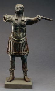 Standing figure of the ancient Egyptian god Horus, wearing Roman military costume bronze, Egypt, 1st-2nd century AD. © The Trustees of the British Museum.
