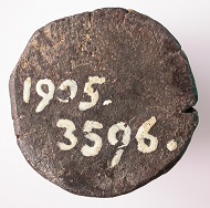 Top and side view of the minting die for the gold gulden of (Anti)Pope Felix V, HMB inv. 1905.3596.