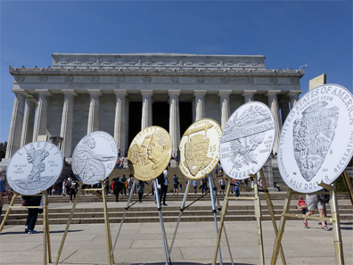 Large prints of the 100th Anniversary of the National Park Service Commemorative Coins are displayed at the Lincoln Memorial during the ceremonial opening of sales March 24, 2016. The second of two commemorative coin programs for 2016, surcharges from the sale of the coins have been authorized to be paid to the National Park Foundation. U.S. Mint photo by Sharon McPike.