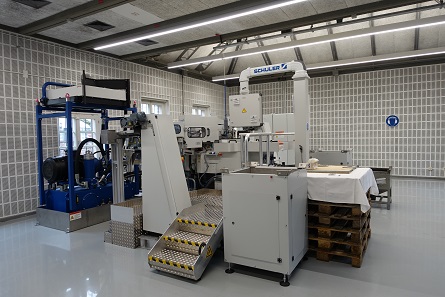 Exclusively designed by Schuler, this press joins the blanks with polymer ring. Photograph: UK.