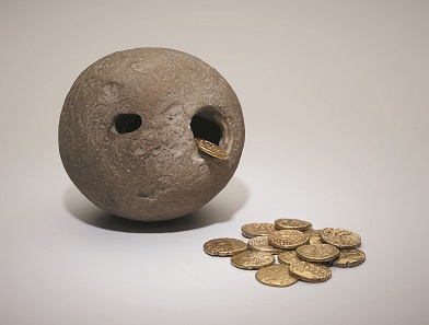 The Westerham hoard, a hoard of gold Iron Age coins found inside a hollow flint in 1927. © The Trustees of the British Museum.