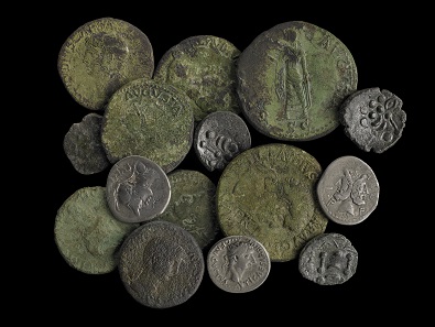 A hoard of Iron Age and Roman coins found in Owermoigne, Dorset, in 2010. © The Trustees of the British Museum.