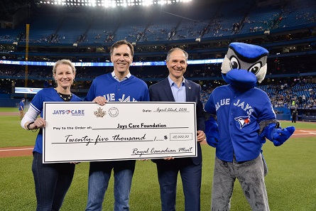 From left: Royal Canadian Mint CEO Sandra Hanington, Minister of Finance Bill Morneau and Robert Witchel, Executive Director of Jays Care Foundation.