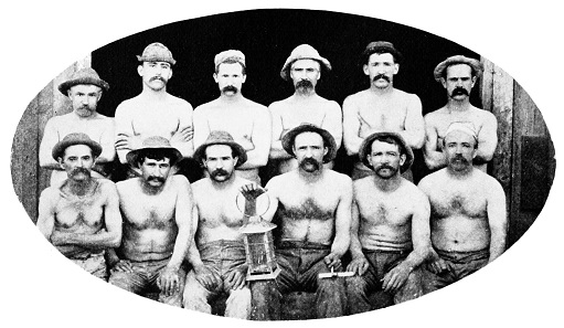 Miners of the Gould and Curry Mine. Because of the intense heat deep down, they do not wear any outer garments. Source: Wikipedia.