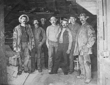 Seven miners of the Comstock Lode. The image's original caption read: To Labor is to Pray. Source: Wikipedia.