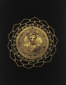 Hair Ornament with Bust of Athena. Gold, red garnets, blue enamel. Greek, Hellenistic period, 2nd century B.C.D. 11.1 cm. Athens, Benaki Museum (inv. no. 1556).