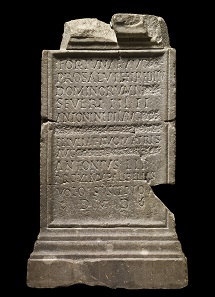 Marble Latin inscription dedicated to the well-being and safe return of Septimius Severus, Caracalla and Geta, on which the names of Geta and Plautilla have been erased; from Rome, AD 202-205. © The Trustees of the British Museum.