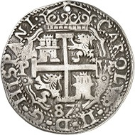 Lot 1747: Bolivia. Carlos III, 1665-1700. 8 reales 1687, Potosi. Yield from the mines at Potosi. Very rare. Holed, very fine. Estimate: 500 GBP. Hammer price: 8,000 GBP.