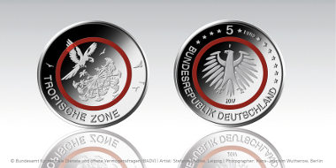 The new 5-euro coin with a red polymer ring. Photo: Federal Office for Central Services and Unresolved Property Issues.