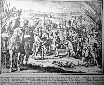 Rudolf II handing over his crown to Matthias, a view of Prague in the background.