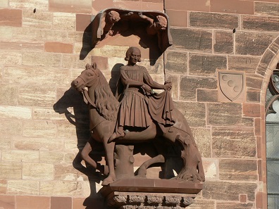 St. Martin splits his coat. Sculpture at the Basel Minster, 1340. Photo: Jacob Burckhardt / CC BY-SA 3.0