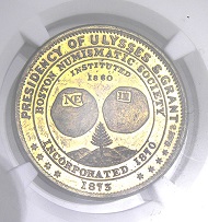 Lot 1: Isaac F. Wood Memorial series medal honoring president Grant, in brass, 1873. NGC MS64.