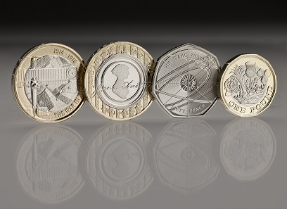 In the photo on the left the reverse of the aviation coin: Great Britain / 2 GBP / Inner: Cupro-Nickel; Outer: Nickel-brass / 12.00g / 28.40mm / Design: Jody Clark (obverse), Tangerine Design (reverse).