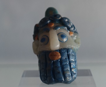 Phoenician glass bead. Photo: KW.