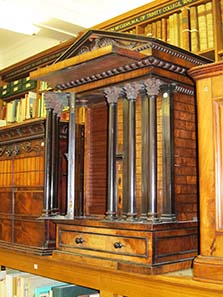 Coin cabinet in the shape of a temple. Image: UK.