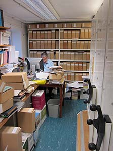 Ted Buttrey in his catalogue room. Image: UK.