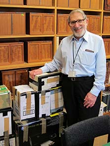 Ted Buttrey with catalogues ready for despatch. Image: UK.