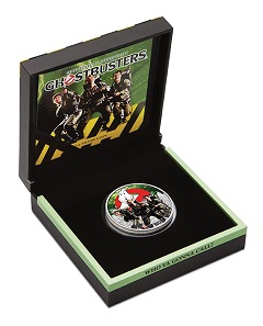 ‘Ghostbusters (TM)’ silver coin in themed packaging.