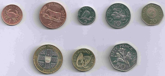 Legal tender only on the Channel Island, Guernsey’s regional currency features some of it typical motifs, next to The Queen and its coat of arms.