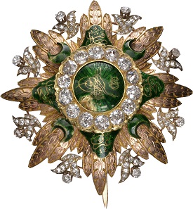 Lot 7176: High Order of Distinction. Breast Star, variant with diamonds in medallion ring. From the Ottoman Collection. RRRR. II. Estimate: 50,000,- euros.