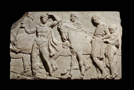 Unmounted youths preparing for the cavalcade, block from the north frieze of the Parthenon, about 438-432 BC, Marble, © The Trustees of the British Museum.