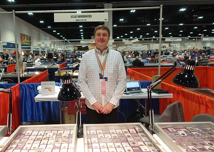 Christopher Baker at the booth of the New York company Atlas Numismatics, which has a table at the FUN despite the fact that many coin dealers are visiting their home town at the same time. Photo: UK.