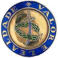An insignia for Valour and Loyalty (left) based on a Mediaeval coin (right), an espadim of King Alphonsus V, circa 1458.