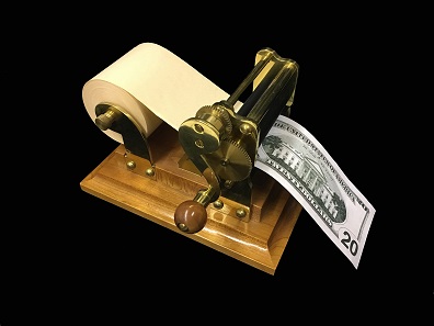 Owen Supreme Magic Money Machine, a conjuring prop that seemingly transforms a blank roll of paper into banknotes. © the Magic Circle