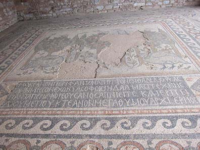 Mosaic floor of the Basilica of Doumetios with the inscription of the dedicator. Photograph: KW.