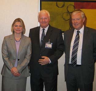 Keynote speaker Justine Greening, MP and Economic Secretary to the UK Treasury (left ) with Richard Haycock, Coin Conference Chairman (centre) and Mike Davis, Chairman of the Royal Mint, honorary sponsors of the Coin Conference (right).