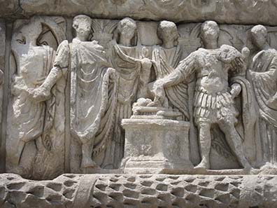 Detail of the Arch of Galerius: sacrifice within the family circle. Photograph: KW