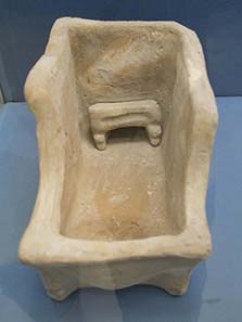 Clay model of a woman bathing. Photograph: KW.