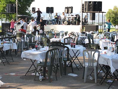 Remains of the party. Some men danced still, and the music was playing at full volume. Photograph: KW.