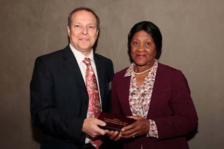 (left to right): An important part of South African history, Alan Demby, the executive chairman of The South African Gold Coin Exchange (SAGCE) presents Mrs Albertina Luthuli, daughter of Chief Albert Luthuli, with the Mandela Luthuli Laureate twin set that will be put on permanent display at the Luthuli Museum.
